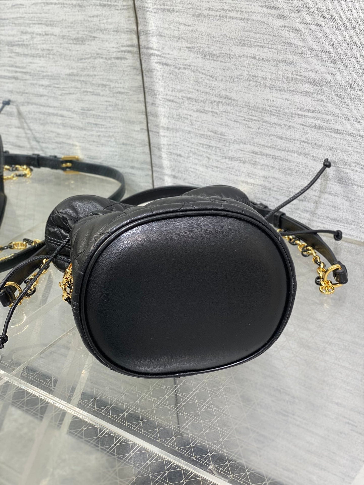 MONTAIGNE MINI 18 BUCKET BAG WITH DRAWSTRING IN BLACK LAMBSKIN