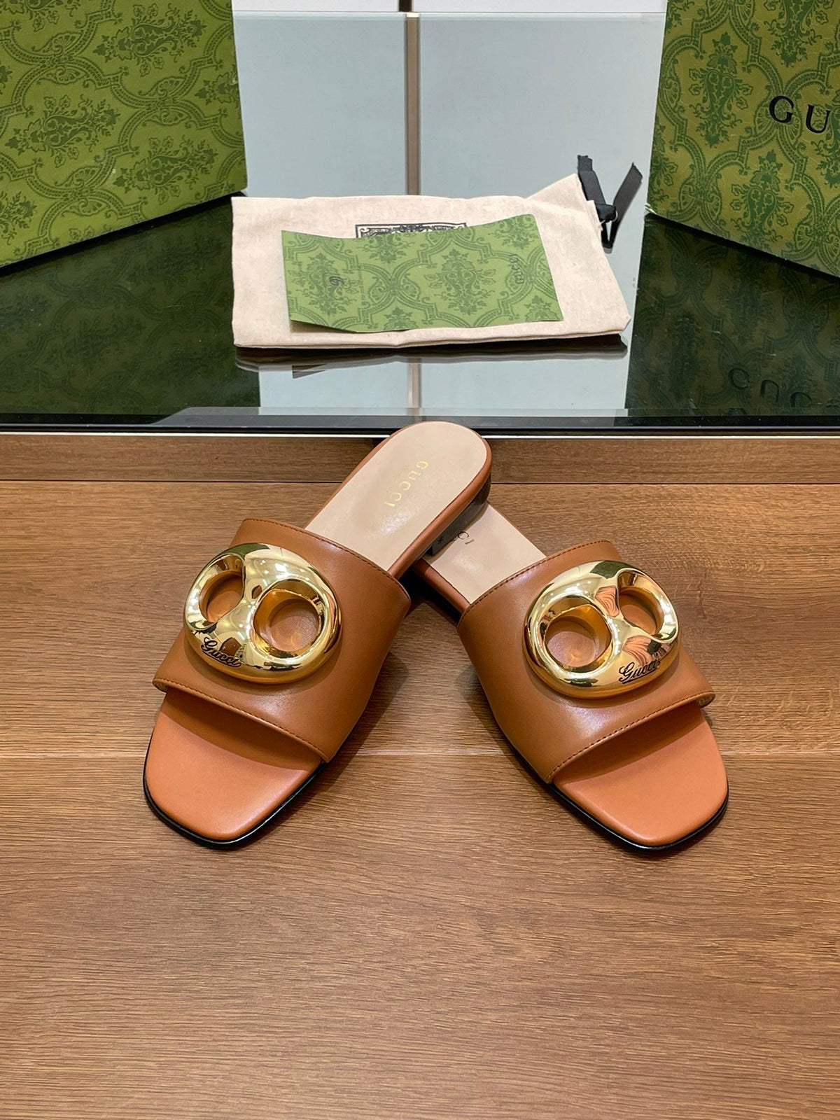 FLAT MULE IN BRONE BROWN CALFSKIN