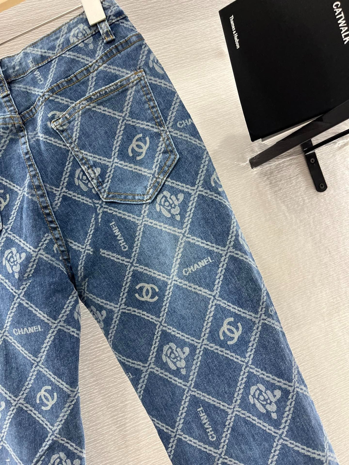 CHANEL FLARED JEANS WITH LOGO PRINT 263984